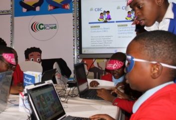 Children enjoy a digital learning experience during the 24th Nairobi International Book Fair at Sarit Center in Nairobi