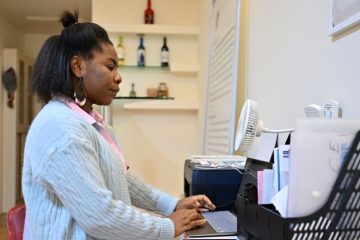 Joy Nkiru Ikpeoha, a Nigerian entrepreneur, works on a laptop at her office in Haikou, south China's Hainan Province