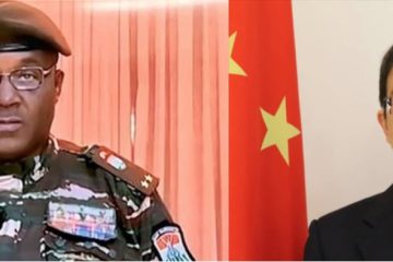 IN PHOTO: Abdourahamane Tchiani, the leader of Niger (L) and Chinese Ambassador to Niger, Jiang Feng (R)