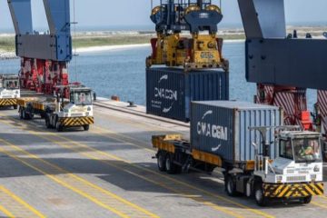 Containers are being loaded onto a truck at Lekki Port in Lagos, Nigeria