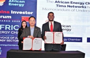 NJ Ayuk (right), founder and executive chairman of the African Energy Chamber, signs an MoU with Tima Networks during a forum held in Shanghai.
