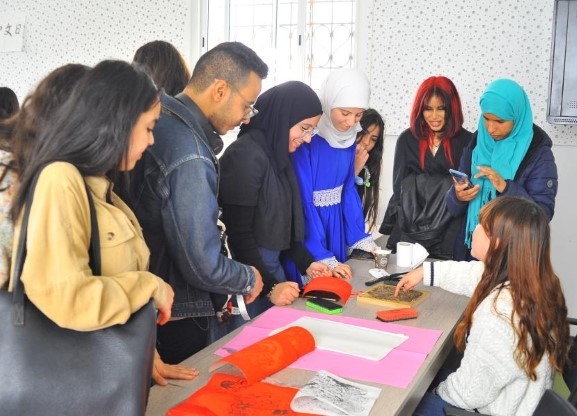Students learn inscription rubbing in the Confucius Institute at Carthage University in Tunis, Tunisia
