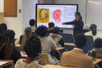 Ding Jumei, in front of the classroom, guides students through a hands-on traditional Chinese medicine (TCM) ear acupressure session at the Confucius Institute of the University of Namibia in Windhoek