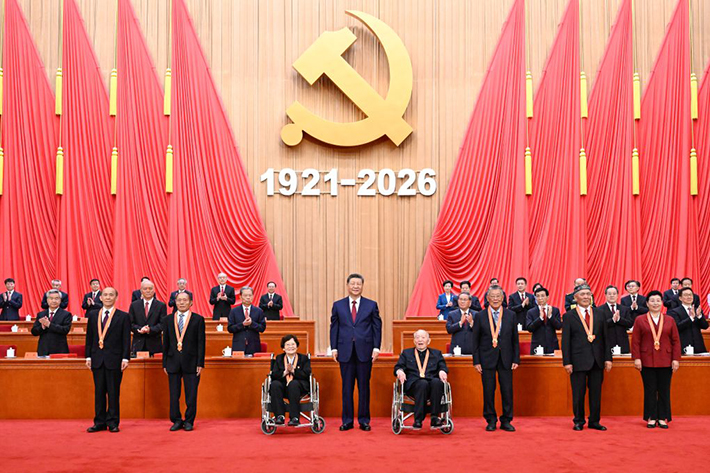 Chinese President Xi Jinping, also general secretary of the CPC Central Committee, confers the July 1 Medal, the Party's highest honour, on model CPC members in Beijing on 1 July